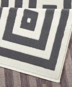 Design vloerkleed geblokt Mono - grijs/crème - close up