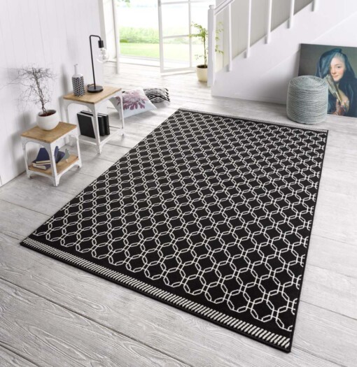 Design vloerkleed Chain - zwart/crème - sfeer