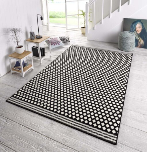 Design vloerkleed gestippeld Capri - zwart/crème - sfeer