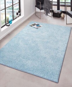 Modern effen vloerkleed Pure - blauw - sfeer