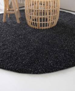 Hoogpolig vloerkleed shaggy Trend effen rond - antraciet - close up zijkant