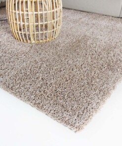 Hoogpolig vloerkleed shaggy Trend effen - beige - close up hoek