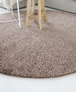 Hoogpolig vloerkleed shaggy Trend effen rond - mokka - close up zijkant