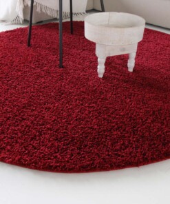 Hoogpolig vloerkleed shaggy Trend effen rond - rood - close up zijkant