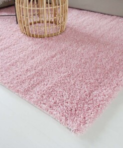 Hoogpolig vloerkleed shaggy Trend effen - lichtroze - close up hoek