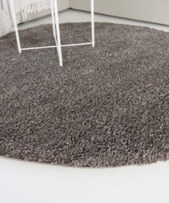 Hoogpolig vloerkleed shaggy Trend effen rond - taupe - close up zijkant