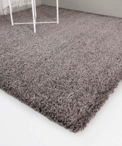 Hoogpolig vloerkleed shaggy Trend effen - taupe - close up hoek