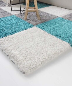 Hoogpolig vloerkleed shaggy Trend blokken - turquoise - close up hoek