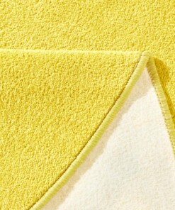 Modern effen vloerkleed rond Fancy - geel - close up, thumbnail