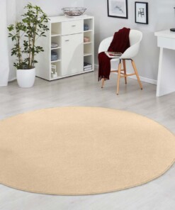 Modern effen vloerkleed rond Fancy - beige - sfeer