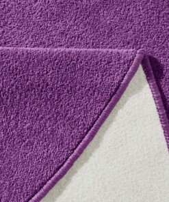 Modern effen vloerkleed rond Fancy - paars - close up, thumbnail