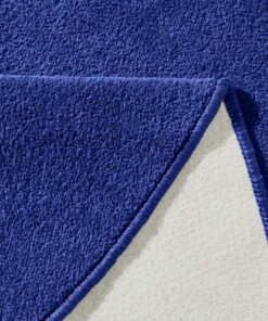 Modern effen vloerkleed rond Fancy - blauw - close up, thumbnail
