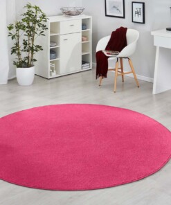 Modern effen vloerkleed rond Fancy - roze - sfeer