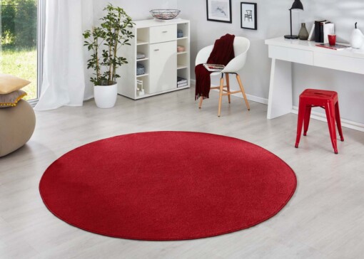 Modern effen vloerkleed rond Fancy - rood - sfeer