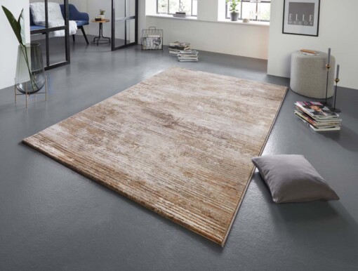 Design vloerkleed Trappes Elle Decoration - bruin/crème - sfeer