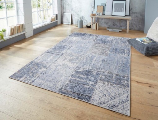 Vlakweef vloerkleed Denain Elle Decoration - blauw/zwart - sfeer