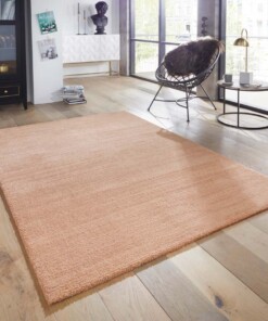 Design vloerkleed Loos Elle Decoration - apricot/roze - sfeer