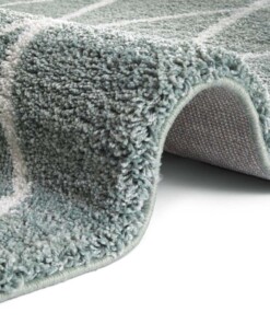 Scandinavisch vloerkleed Elle Decoration Abbe - groen/crème - close up, thumbnail