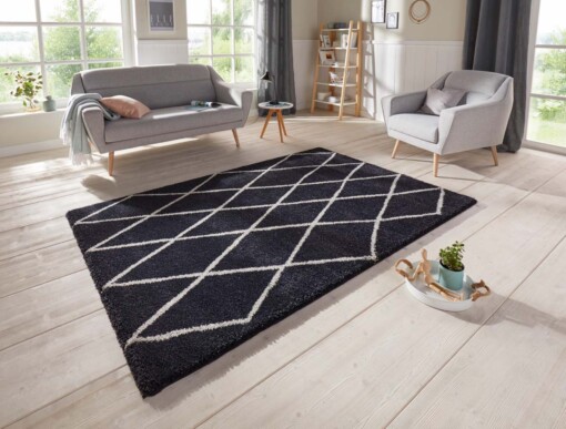 Scandinavisch vloerkleed Elle Decoration Abbe - antraciet/zilver - sfeer
