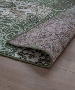 Patchwork vloerkleed factum Joy de Vivre - olijfgroen - close up vouw, thumbnail