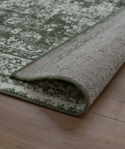 Vintage Vloerkleed Orbis - Joy de Vivre - olijfgroen Vintage Vloerkleed Orbis - Joy de Vivre - olijfgroen
