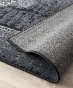 Vintage Vloerkleed Numisma - Joy de Vivre - zwart - close up vouw, thumbnail Vintage Vloerkleed Numisma - Joy de Vivre - zwart - close up vouw, thumbnail