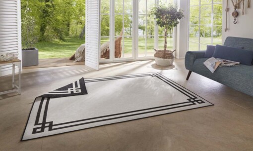 Binnen & buiten vloerkleed Manito - zwart/crème - sfeer
