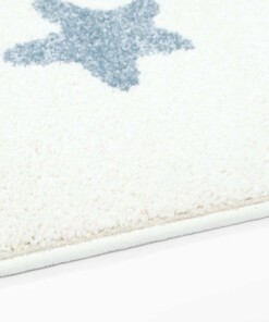 Vloerkleed kinderkamer Kleine Sterren 3D - crème/blauw - close up zijkant, thumbnail