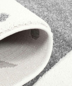 Rond vloerkleed kinderkamer Sterren 3D - crème/grijs - close up vouw, thumbnail