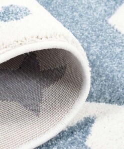Rond vloerkleed kinderkamer Sterren 3D - crème/blauw - close up vouw, thumbnail