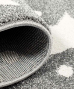 Rond vloerkleed kinderkamer Sterren 3D - grijs/crème - close up vouw, thumbnail