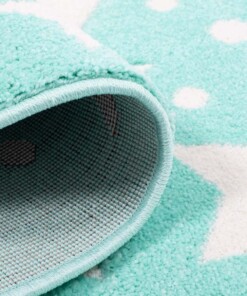 Rond vloerkleed kinderkamer Sterren 3D - mintblauw/crème - close up vouw, thumbnail