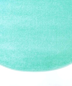 Rond vloerkleed kinderkamer effen Softpile - mintblauw - close up zijkant, thumbnail
