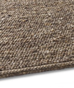 Wollen vloerkleed handweef Oslo - bruin - close up zijkant, thumbnail