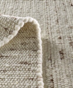 Wollen vloerkleed handweef Oslo - crème - close up vouw, thumbnail Wollen vloerkleed handweef Oslo - crème - close up vouw, thumbnail