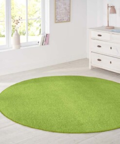 Modern effen vloerkleed rond Nasty - groen - sfeer