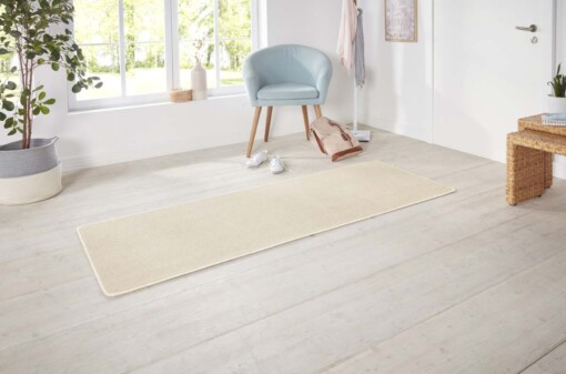 Moderne effen loper Nasty - crème - sfeer
