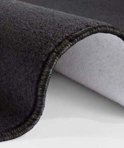 Modern effen vloerkleed rond Nasty - zwart - close up, thumbnail