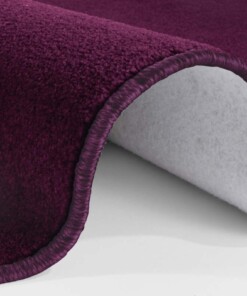 Modern effen vloerkleed rond Nasty - paars - close up, thumbnail