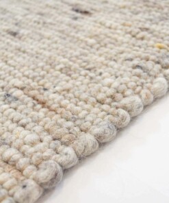 Wollen vloerkleed handweef Ylva - beige/grijs - close up zijkant, thumbnail Wollen vloerkleed handweef Ylva - beige/grijs - close up zijkant, thumbnail