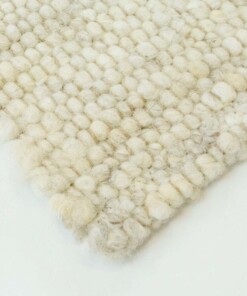 Wollen vloerkleed handweef Veve - beige/crème - close up hoek, thumbnail