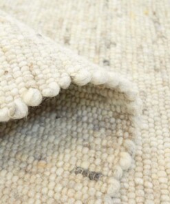 Wollen vloerkleed handweef Ylva - beige - close up vouw, thumbnail