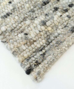 Wollen vloerkleed handweef Veve - grijs/crème - close up zijkant, thumbnail