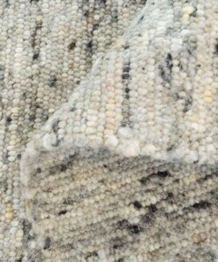 Wollen vloerkleed handweef Veve - grijs/crème - close up vouw, thumbnail