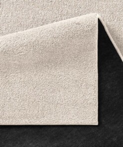 Vierkant effen vloerkleed Qualis - crème - close up vouw, thumbnail