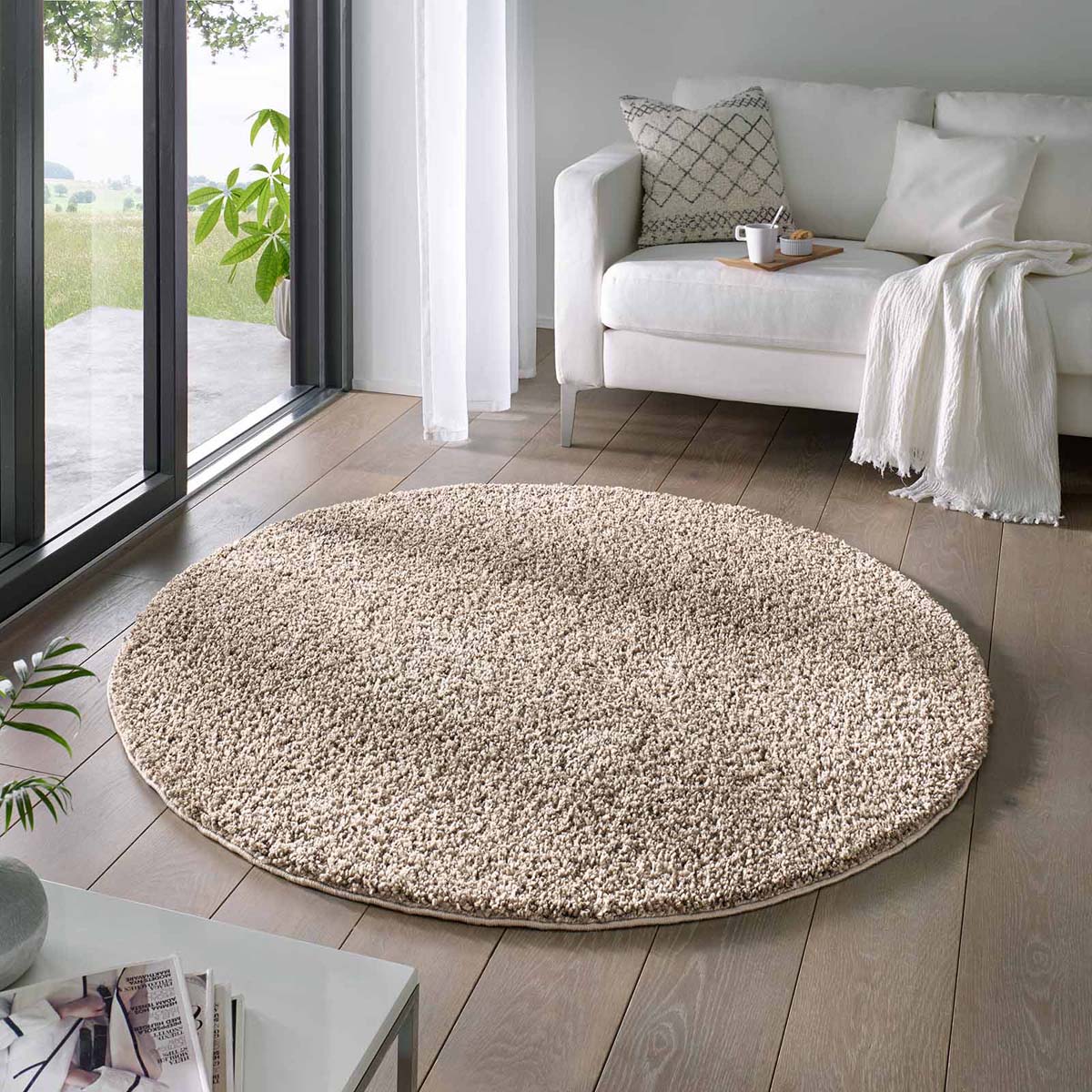 Rond vloerkleed hoogpolig effen Classic beige | Tapeso