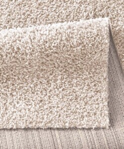 Hoogpolig vloerkleed effen Classic - crème - close up vouw, thumbnail Hoogpolig vloerkleed effen Classic - crème - close up vouw, thumbnail