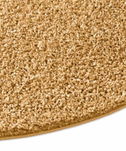 Rond vloerkleed hoogpolig effen Spectrum - mosterdgeel - close up zijkant, thumbnail