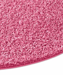 Rond vloerkleed hoogpolig effen Spectrum - roze - close up zijkant, thumbnail