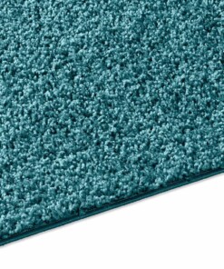 Hoogpolig vloerkleed effen Spectrum - turquoise - close up zijkant, thumbnail Hoogpolig vloerkleed effen Spectrum - turquoise - close up zijkant, thumbnail